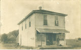 Men on porch of post office, Iowa, July 18, 1911