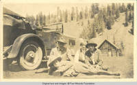 Two unknown men and two women in front of Mt. View Inn at the head of Pecos River Valley
