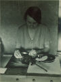 Woman measuring growth on an x-ray film, The University of Iowa, 1920s