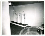 Foot-powered sink and urinals in State Gymnasium locker room