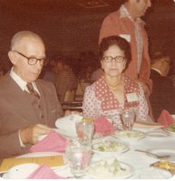 Mr. and Mrs. C. Iles Heady sit at a conference dinner