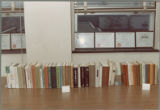 Earl Heady's desk showing his books and six awards, 1983
