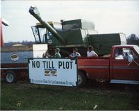 No-Till Plot Sign on Truck with Combine in Back