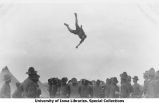 Cadet at camp getting a blanket toss, The University of Iowa, 1912
