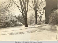 Grey house carport in winter