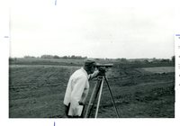 Surveyor Taking Field Measurements, 1972