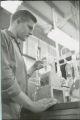 Man working with Chemical apparatus