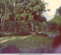 John, Jr. walking on rocks in Rock garden
