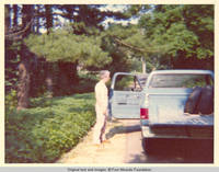 Bill MacLeod by truck on the lane 