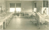 Patients and nurses in a hospital ward at Seashore Hall, The University of Iowa, 1910