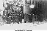 Football fans outside Whetstone Drug, Iowa City, Iowa, ca. 1920