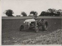 Vincent Goedken operating a tractor.