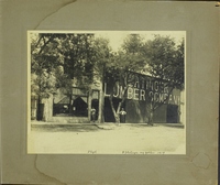 Floyd and D.J. Entinger Stand in front of the Entinger Lumber Company