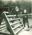 Small children  playing in the snow, The University of Iowa, January 1938