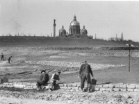 Men work on the State Capitol Grounds