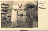 Baking is done in hearth oven, bakery, Amana, Iowa, ca.1950s