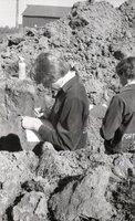 1970s FFA students work on a project around a ditch