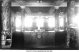 Circulation desk in library from east entrance, The University of Iowa, 1910