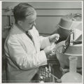 Researcher working with test tube samples