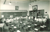 Students reading in small groups, The University of Iowa, May 19, 1932