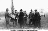 Governor William L. Harding saluting colors during inspection on Iowa Field, The University of Iowa, May 12, 1917
