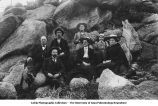 People on granite boulders, Overland Hill, Iowa, late 1890s or early 1900s