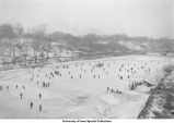 Ice skaters on Iowa River, Iowa City, Iowa, between 1915 and 1920