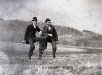 Two men on fence