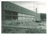 Dismantiling part of Main Library's south wall to add first addition, the University of Iowa, 1961