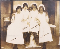 Four nursing students rom the class of 1928 pose for picture
