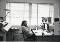 Unidentified man sits in office