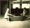 Toddlers on an indoor seesaw, The University of Iowa, January 12, 1938