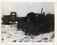 Don Gibson Stands Beside Farm Machinery in Davis County