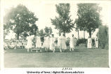 Women in Grecian dress dancing at a June celebration, The University of Iowa, 1920