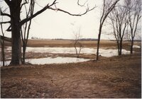 Melting snow on Construction site where pond is being built on Frank Johnson's farm