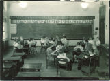Students reading in small groups, The University of Iowa, January 22, 1932