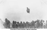Cadet getting a blanket toss, The University of Iowa, 1912