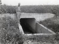 Man stands on watershed structure