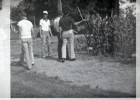 Group of Men in Corn Field