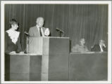 Earl O. Heady speaking before a group in Hungary, viewed from the left, 1979