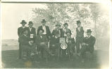 Men drinking and smoking cigars, Iowa, 1920s