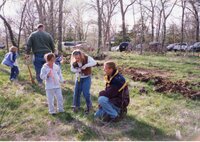 2002  Soil Conservationist Troy Deutmeyer helps girl scouts plant trees