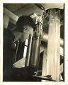 Engineering student reading results in a laboratory, The University of Iowa, 1939