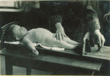 Measuring an infant's growth, The University of Iowa, 1920s