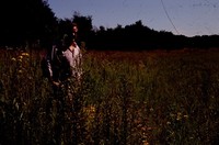 Eric Hoien Poses in Native CRP Field.