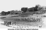 Governor N.E. Kendall reviewing military band on Iowa Field, The University of Iowa, June 4, 1921