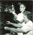 Student and researcher working in a laboratory, The University of Iowa, November 1952