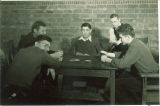Students playing cards in the Kellogg Dormitory, the University of Iowa, November 1933