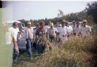 Group of Men in Corn Field