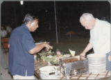 Earl O. Heady in a buffet line during his visit to Thailand, April 1983